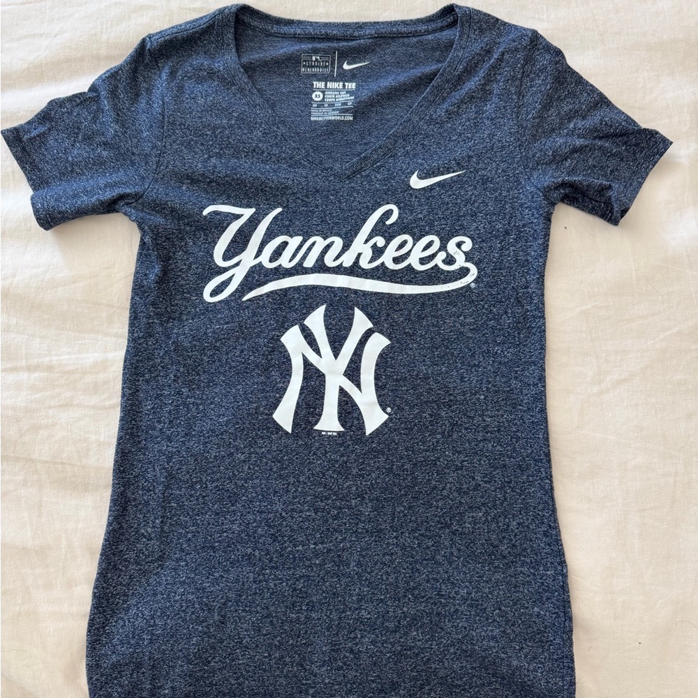Nike Heathered Navy V‑Neck Graphic Tee with White Print